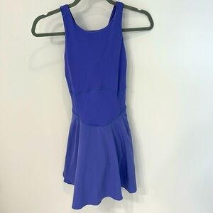 Lululemon court crush tennis dress with built-in shorts, size 2 purple